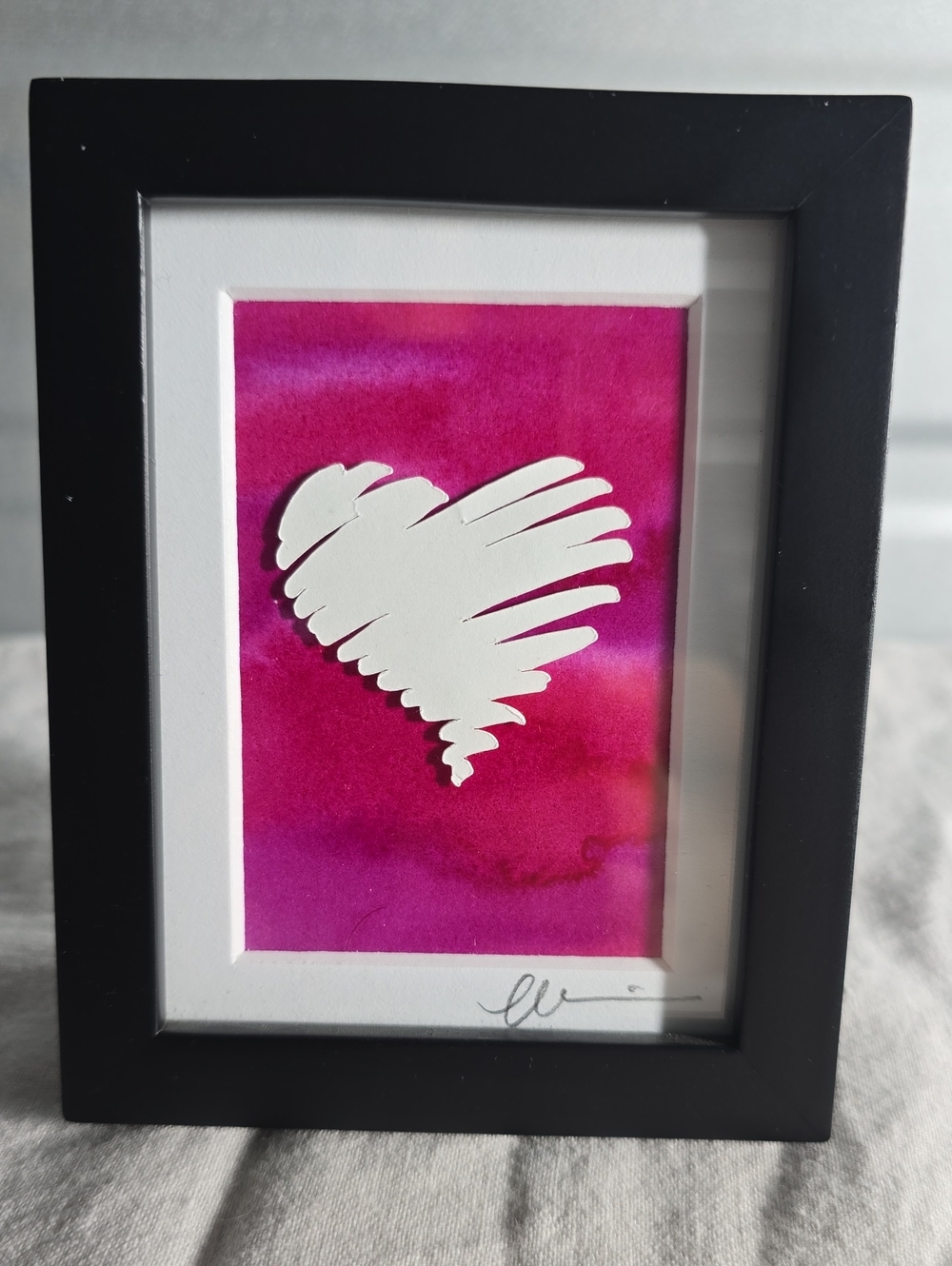 Framed White Heart on Pink Background